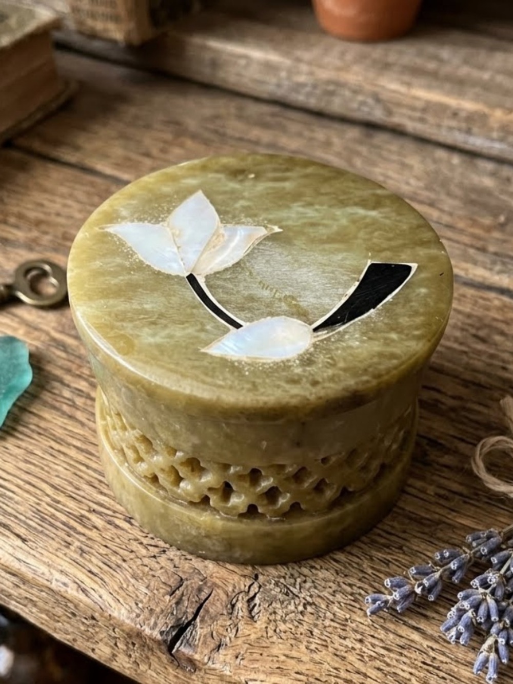 Vintage hand-carved olive-green soapstone trinket or pill box
Floral inlay